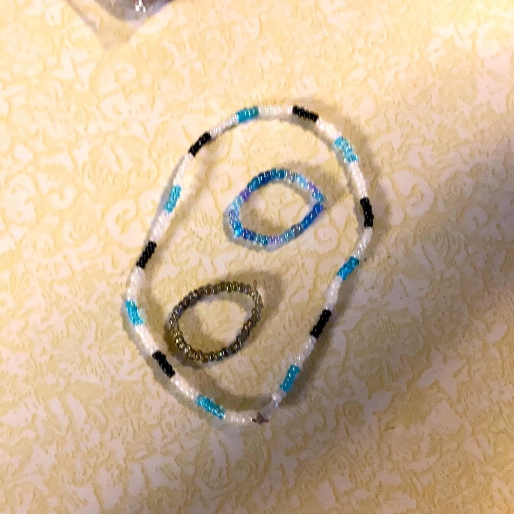 Girls bracelet and two rings